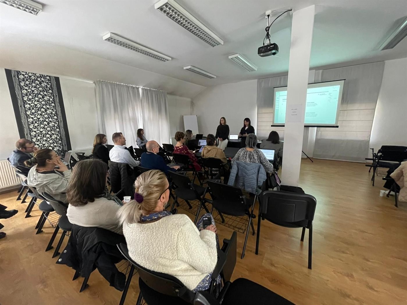 Participants following the presentation